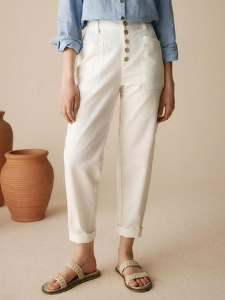 LINTICO Heidi linen blend button fly trousers, simple design, relaxed fit, in a neutral color, showcased on a model.