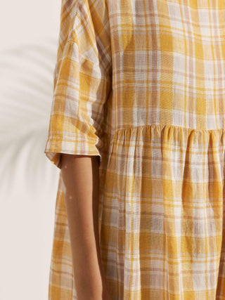 LINTICO 100% linen A-line midi dress in Valencia color, featuring a flowing silhouette and lightweight fabric.