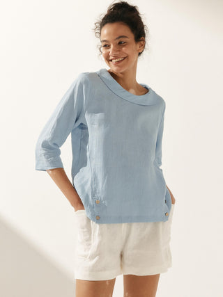 LINTICO Linen Gingham Checked Round Collar Top with soft-fold collar, displayed on a hanger, showcasing light fabric and classic pattern.