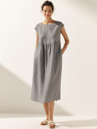 LINTICO linen maxi dress with cap sleeves, washed finish, designed by JOAN, featuring a relaxed midi dress style.
