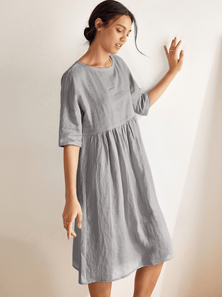 Neutral grey 100% linen A-line midi dress by LINTICO featuring a relaxed fit and elegant design.