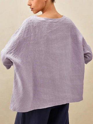 Lavender linen boatneck top with 3/4 length sleeves by LINTICO, showcasing a lightweight, breathable blouse for casual wear.