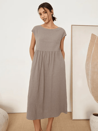LINTICO 100% linen cap sleeve washed maxi dress in cloud grey, featuring a relaxed fit and elegant midi length.