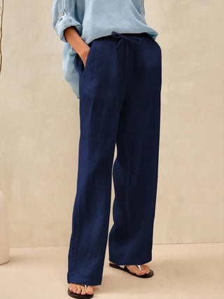 Navy blue 100% linen classic pants by LINTICO, stylish and comfortable bottoms with a tailored fit and relaxed silhouette.