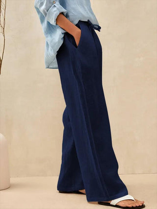 Navy blue 100% linen classic pants by LINTICO with a tailored fit and waistband, displayed on a plain background.