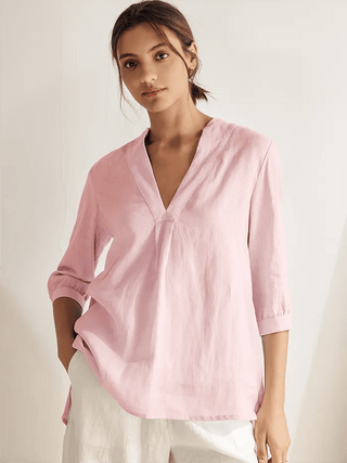 Light pink 100% linen dress shirt by LINTICO, classic blouse with a tailored fit and natural fabric texture.