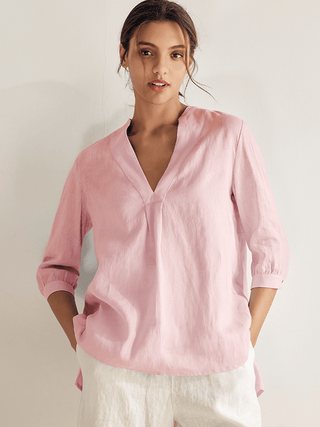 Light pink 100% linen dress shirt for women by LINTICO, featuring a tailored fit and classic collar style.