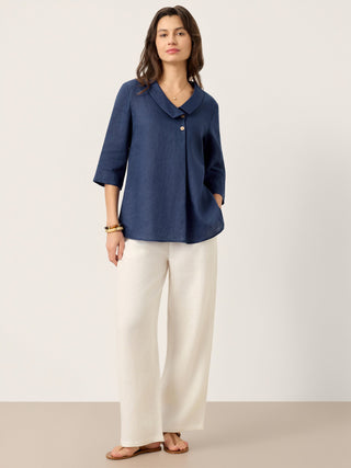 Navy blue linen long top with asymmetric collar and inverted pleat, by LINTICO, featuring a relaxed, stylish fit.