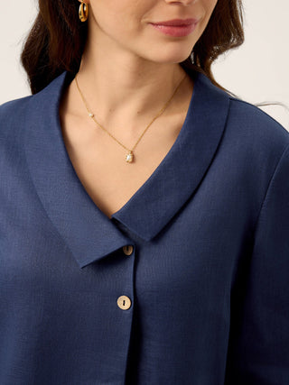 Navy blue linen long top with asymmetric collar and inverted pleats by LINTICO, showcasing a stylish, flowy design.