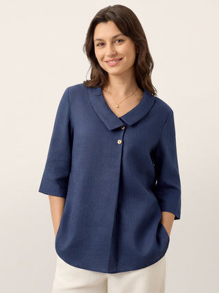 Navy blue linen long top with asymmetric collar and inverted pleat design by LINTICO, featuring a relaxed fit and elegant style.