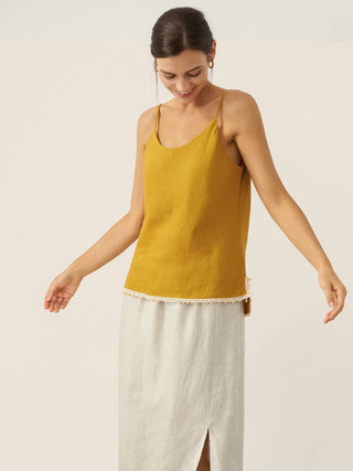 Honey yellow linen camisole with beaded hem by LINTICO, featuring a relaxed fit and sleeveless design.