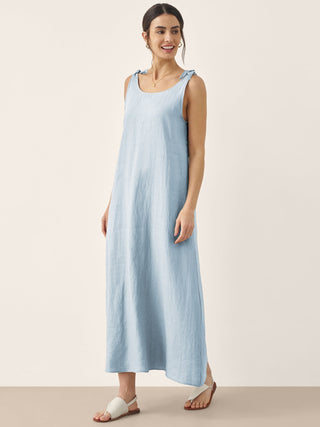 Baby blue 100% linen camisole maxi dress by QEARL, featuring a flowing, lightweight design perfect for warm weather.