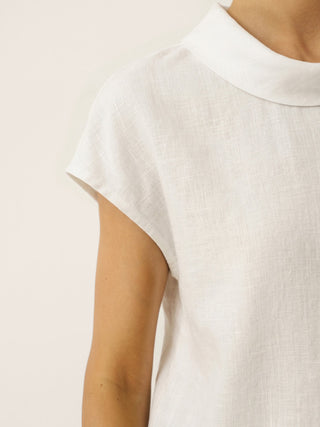 Optic white linen cap sleeve blouse with soft fold collar by LINTICO, showcasing lightweight, breathable fabric and stylish design.