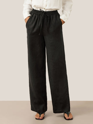 Black linen pants from LINTICO's 100% Linen Classic Pants LYON collection, featuring a relaxed fit and tailored waistband.