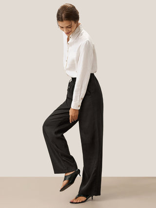 Charcoal black 100% linen classic pants by LINTICO, stylish and comfortable linen bottoms for a casual or professional look.