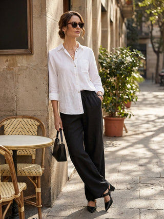 Charcoal black 100% linen classic pants from LINTICO, showcasing relaxed fit and tailored design for stylish comfort.