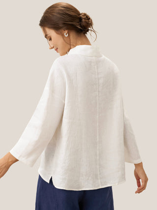 Off-white linen side neck top by LINTICO featuring a classic design and relaxed fit.