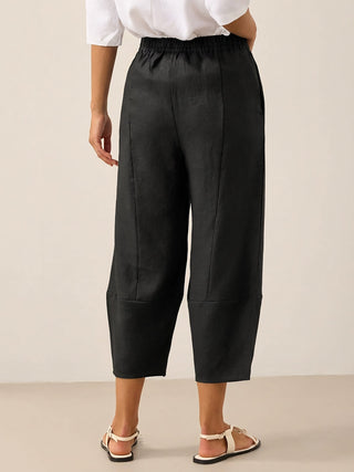 Charcoal black linen crop pants by LINTICO, featuring a relaxed fit and lightweight 100% linen fabric.