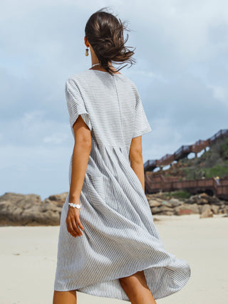 LINTICO Morgan linen midi dress with pinstripe panels and short sleeves, showcasing a stylish, breathable summer dress.