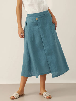LINTICO FRESSA dove blue linen wrap skirt with elastic waist and angled closure, stylish and comfortable for casual wear.
