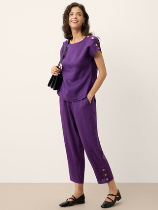 Dark purple 100% linen artisan button tapered pants by LINTICO, featuring a relaxed fit and tailored design.