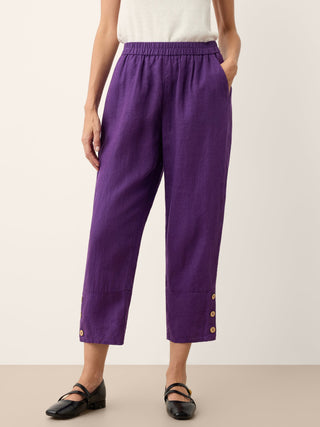 Dark purple 100% linen artisan button tapered pants by LINTICO, styled as stylish, comfortable women's bottoms with a tapered fit.
