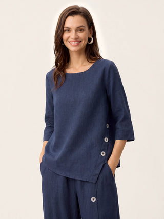 Navy blue linen top with asymmetric hem and button trim from LINTICO, featuring a stylish, relaxed fit and natural fabric texture.