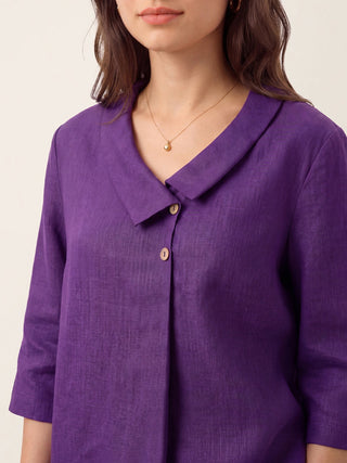 Dark purple linen long top with asymmetric collar and inverted pleat, designed by LINTICO, featuring a stylish and relaxed fit.
