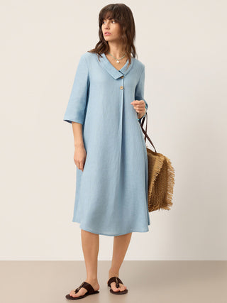 LINTICO Winifred ice blue linen A-line midi dress with asymmetric shawl collar, perfect for casual or elegant occasions.