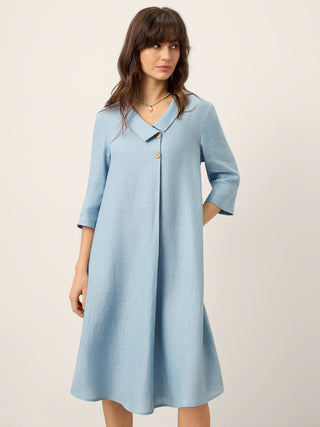 LINTICO Winifred 100% linen asymmetric shawl collar A-line midi dress in ice blue, showcasing elegant, flowing fabric and stylish design.