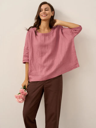 LINTICO 100% linen boatneck blouse with 3/4 length sleeves in lavender, showcasing a lightweight, relaxed fit top.