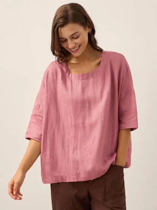 Lavender linen boatneck top with 3/4 length sleeves by LINTICO, featuring a relaxed fit and lightweight fabric.