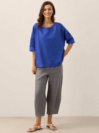 LINTICO 100% linen boatneck blouse with 3/4 length sleeves in royal blue, featuring a relaxed fit and elegant design.
