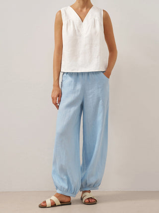 Baby blue Linen pants with a broad elastic waistband by LINTICO, showcasing relaxed fit and lightweight breathable fabric.