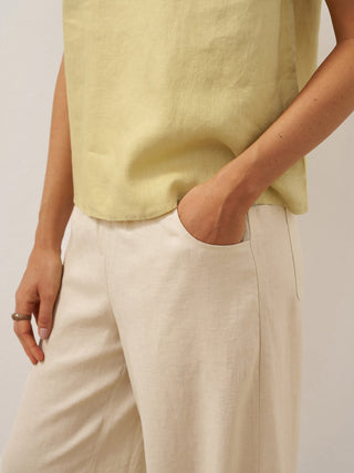 LINTICO TALIA khaki linen pants with wide elastic waistband, relaxed fit, and breathable fabric for comfortable everyday wear.