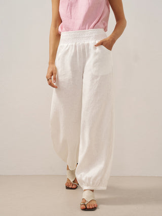 LINTICO TALIA 100% linen wide-leg pants with broad elastic waistband in optic white, casual and breathable for comfortable wear.