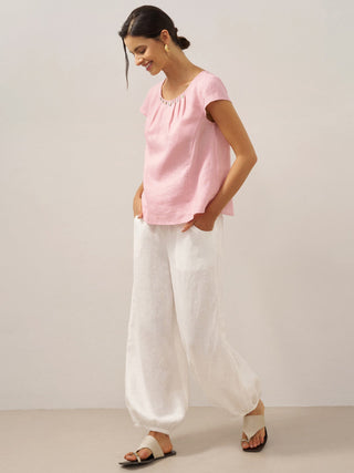LINTICO TALIA 100% linen wide-leg pants with broad elastic waistband in optic white, casual and breathable women's bottoms.