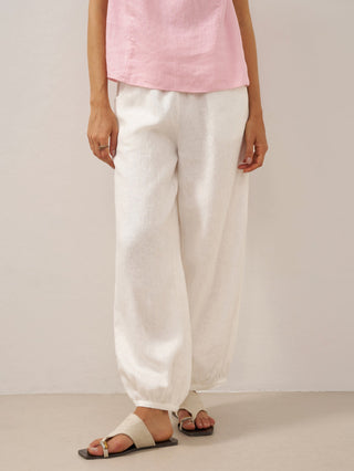 LINTICO TALIA 100% linen wide-leg pants with broad elastic waistband in optic white, casual and breathable bottoms.