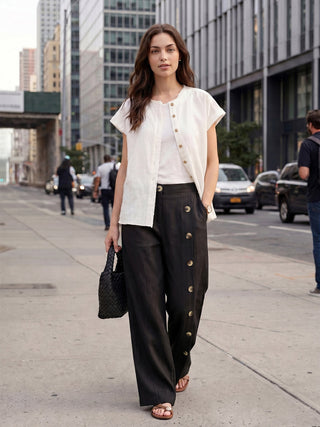 LINTICO Katya 100% linen buttoned slit-hem pants in charcoal black, featuring a relaxed fit and stylish design.