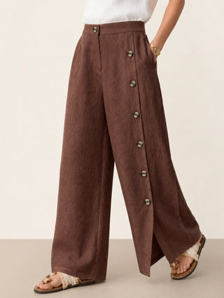 LINTICO 100% linen buttoned slit-hem pants in espresso brown, showcasing a relaxed fit and stylish design.