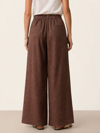 LINTICO Katya 100% linen buttoned slit-hem pants in espresso brown, stylish bottoms with a relaxed fit and side pockets.