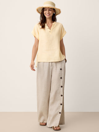 LINTICO Katya 100% linen buttoned slit-hem pants in stone oat color, stylish breathable bottoms with a relaxed fit.