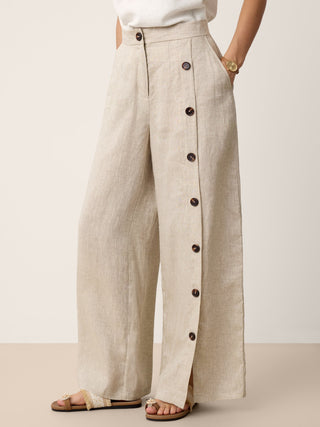 LINTICO Katya 100% linen buttoned slit-hem pants in stone oat color, stylish and lightweight for casual wear.