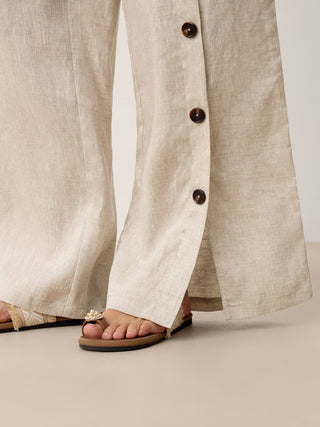 LINTICO linen buttoned slit-hem pants in stone oat color, relaxed fit with side slits, casual bottoms for comfortable style.