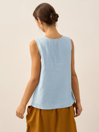 Baby blue linen tank top with button-down front from LINTICO, featuring a sleeveless, casual design perfect for warm weather.