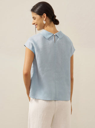 LINTICO 100% linen cap sleeve top with soft fold collar in ice blue, casual blouse for warm weather.