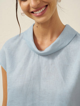 LINTICO ice blue linen cap sleeve blouse with soft fold collar, lightweight and breathable top for casual or summer wear.