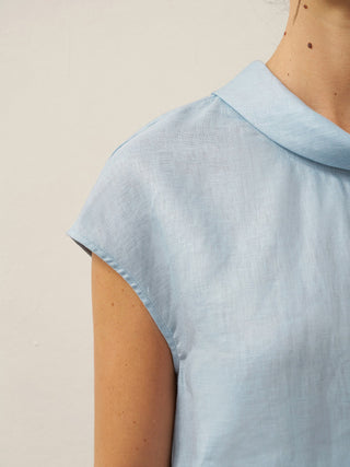 LINTICO 100% linen cap sleeve blouse with soft fold collar in ice blue, lightweight and breathable top for warm weather.