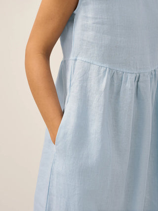 Baby blue linen maxi dress with cap sleeves, washed finish, from LINTICO's JOAN collection, styled with a relaxed fit.