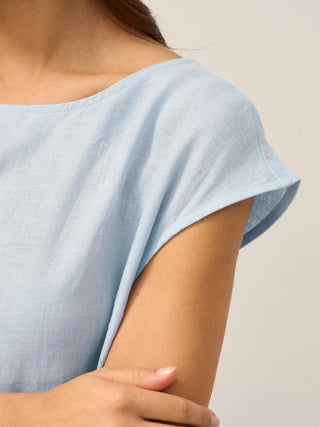 LINTICO Joan baby blue 100% linen cap sleeve washed maxi dress, midi length, lightweight and flowy for casual summer wear.
